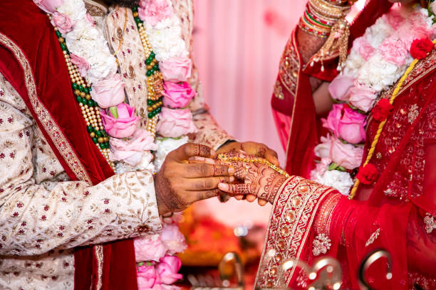 Indian Hindu wedding ceremony ritual items hands close up